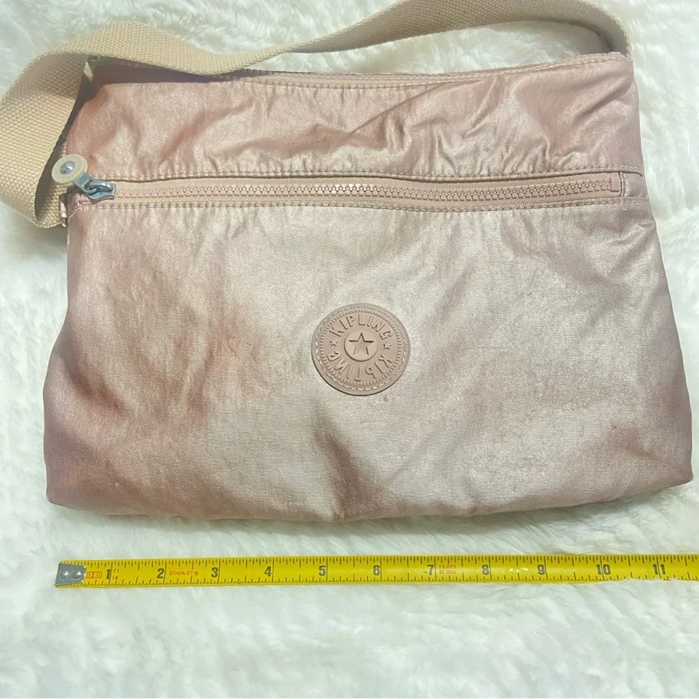 Rose Gold Kipling Pink Crossbody Bag with Signature Style